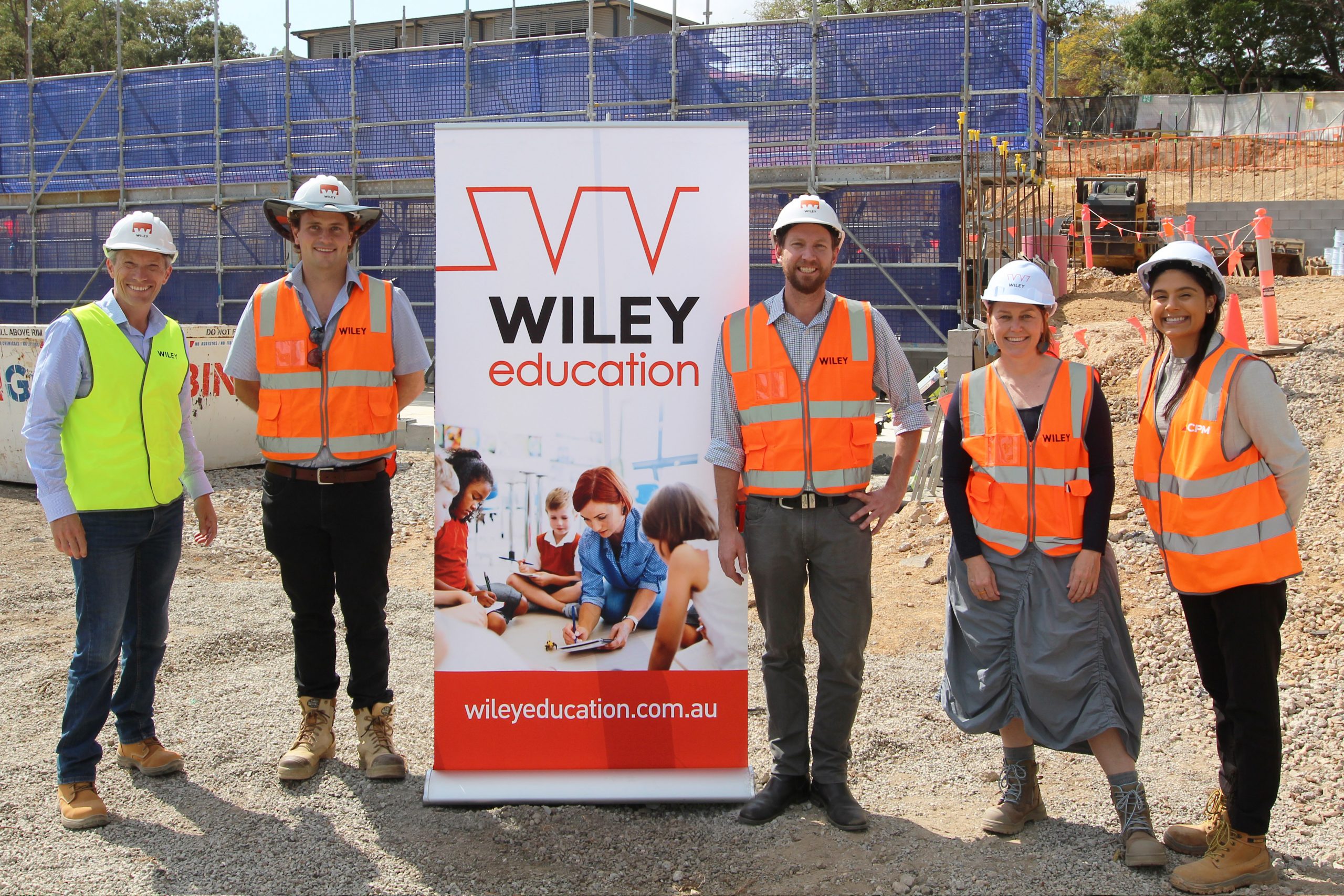 The Wiley team (including Operations Director Tom Wilson Managing Director Suzie Wiley at the sod turning ceremony at Seven Hills State School